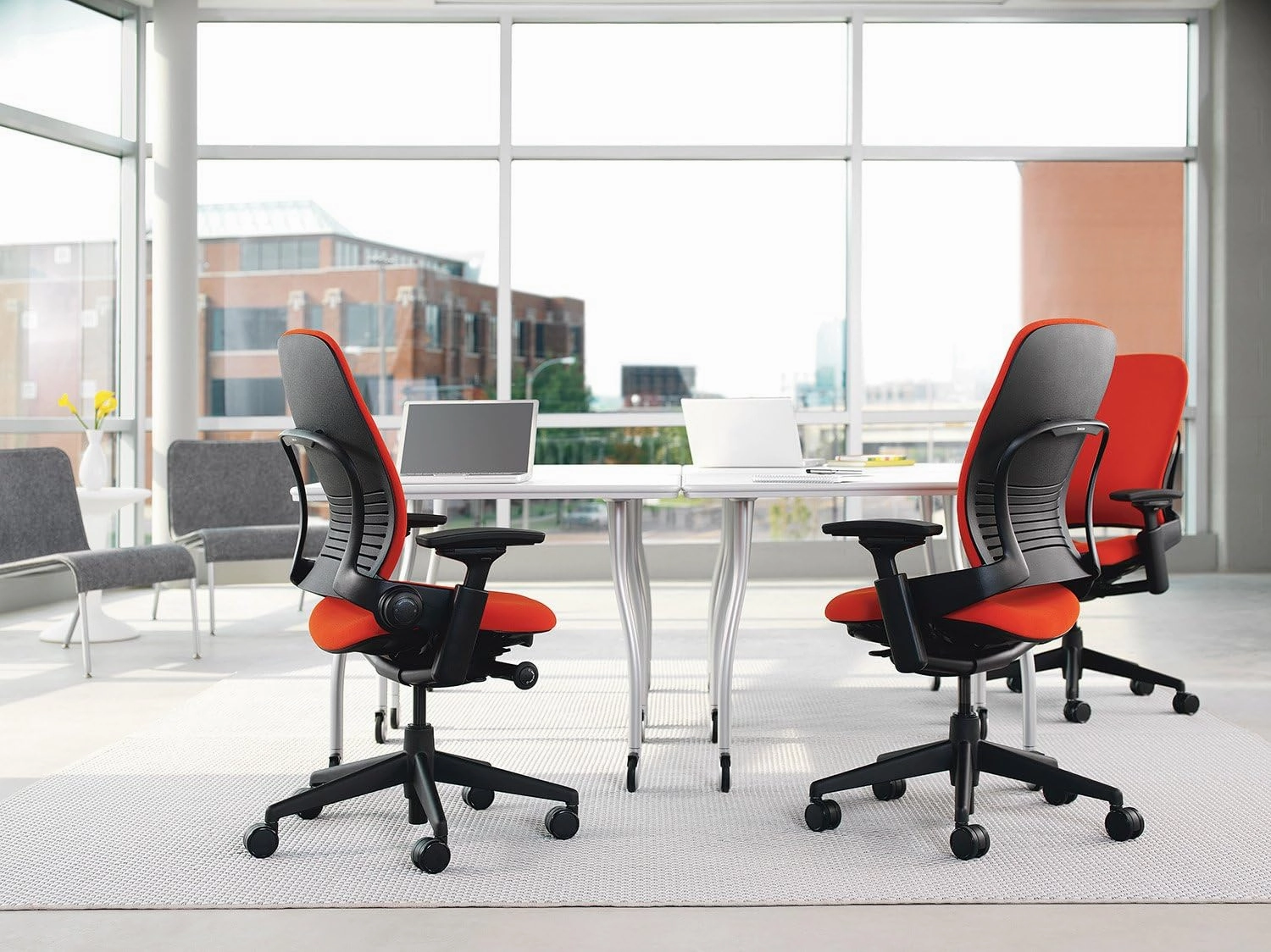 Steelcase Leap V2 Desk Chair in Buzz2 Carrot Fabric - 4-Way Highly Adjustable Arms - Black Frame and Base - Soft Dual Wheel Hard Floor Casters